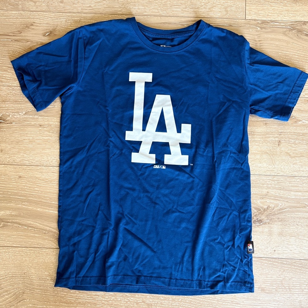Genuine Merchandise Blue T-Shirt with White Logo